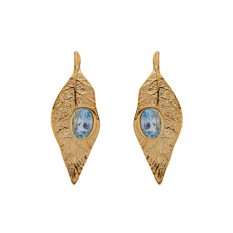 Conjunto de joyas de hojas: collar, anillo, pendientes y pulsera de granate, topacio azul y peridoto.